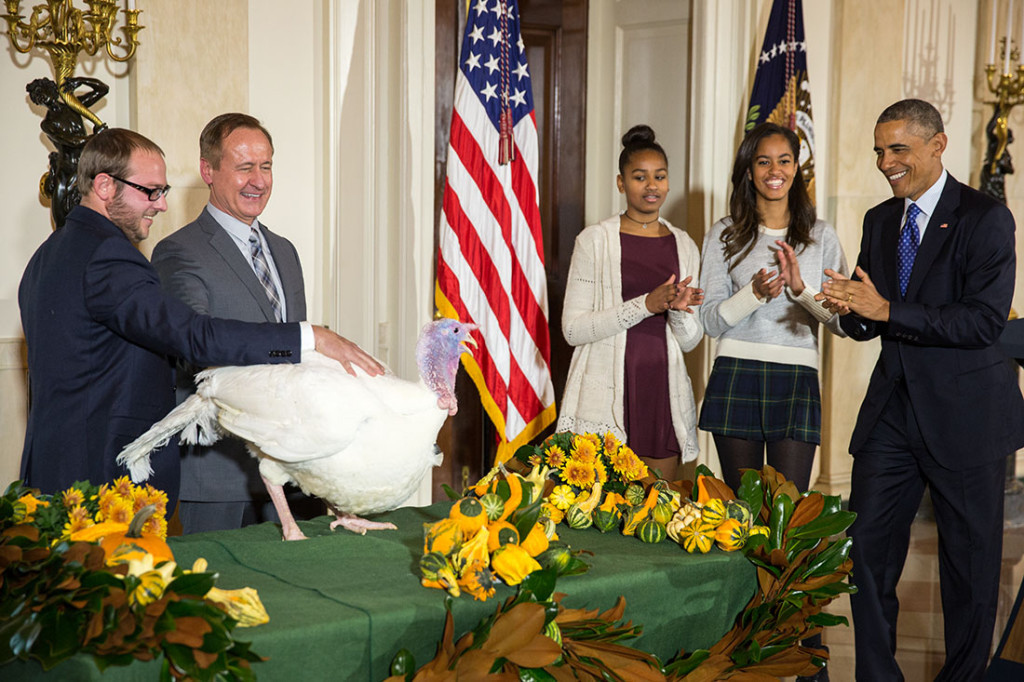 President Barack Obama, National Turkey Federation Chairman Gary Cooper; and son Cole Cooper participate in the annual National Thanksgiving Turkey pardon ceremony in the Grand Foyer of the White House, Nov. 26, 2014. (Official White House Photo by Chuck Kennedy)